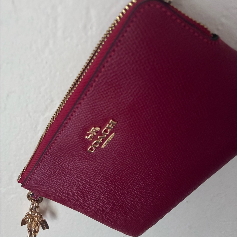 Coach Pebbled Leather Zip Wristlet in Berry